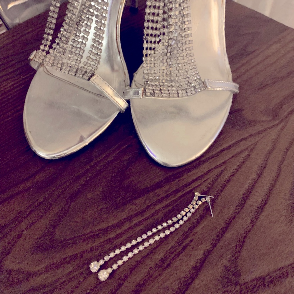Silver ankle-strap heels & diamond drop earrings